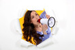 Brunette speaking into megaphone