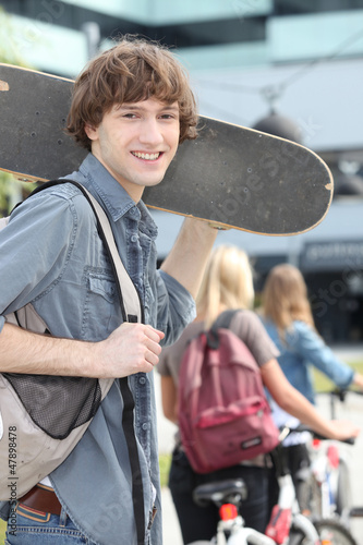 Photo: teenager with skateboard teenager with skateboard