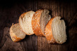 sliced wholemeal sesame bread on wood