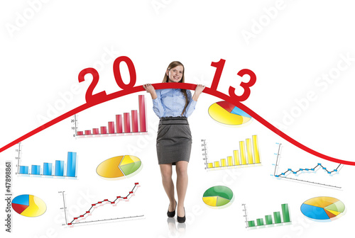 Photo: Woman with statistics curve Woman with statistics curve
