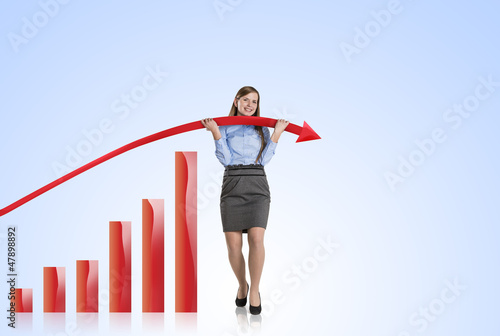 Photo: Woman with statistics curve Woman with statistics curve