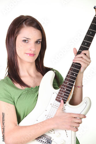 Photo: Woman with a guitar Woman with a guitar