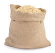 Photo: Sack of wheat grains isolated on white background Sack of wheat grains isolated on white background