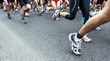 People running marathon on city street