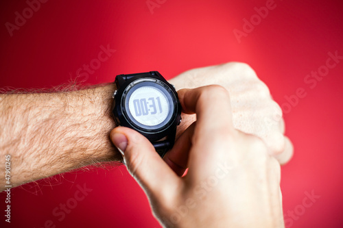 Photo: Runner ready to run with sport watch Runner ready to run with sport watch