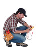 Electrician with multimeter