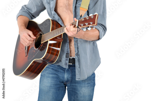 Photo: Man playing acoustic guitar Man playing acoustic guitar