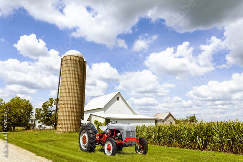 Photo: Traditional American Red Barn With Vintage Tractor Traditional American Red Barn With Vintage Tractor