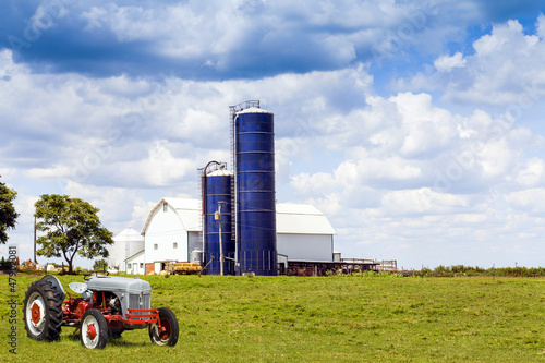 Photo: Traditional American Red Barn With Vintage Tractor Traditional American Red Barn With Vintage Tractor