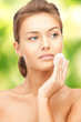 beautiful woman with cotton pad