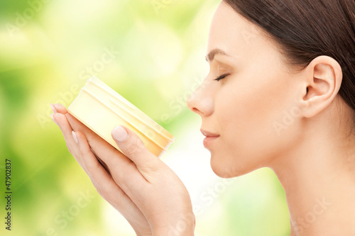 Photo: beautiful woman with moisturizing creme beautiful woman with moisturizing creme