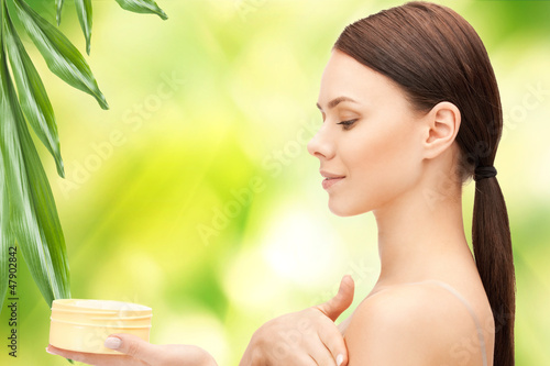 Photo: beautiful woman with moisturizing creme beautiful woman with moisturizing creme