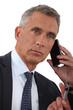 close-up of businessman talking on his cell