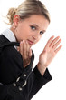 Businesswoman waving goodbye