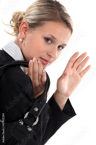 Photo: Businesswoman waving goodbye Businesswoman waving goodbye