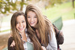 Photo: Mixed Race Women Pose for a Portrait Outside Mixed Race Women Pose for a Portrait Outside