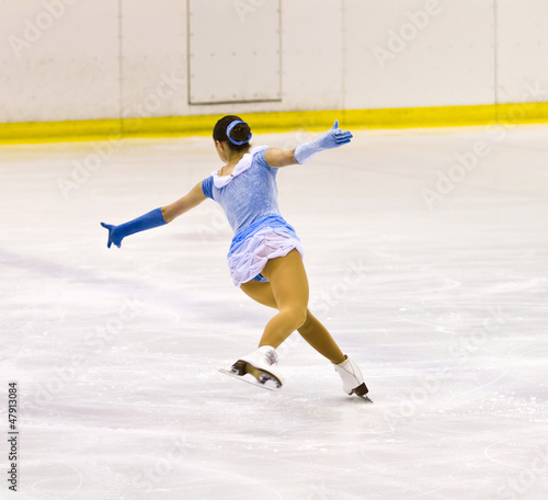 Photo: woman figure skater woman figure skater