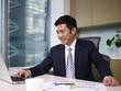 asian businessman working in office