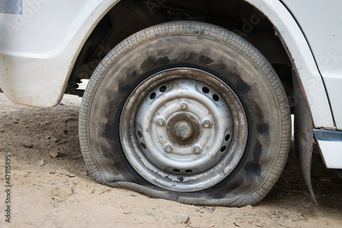 Photo: Deflated damaged tyre Deflated damaged tyre