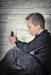 Jugendlicher mit Smartphone