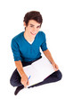 Young happy student carrying books