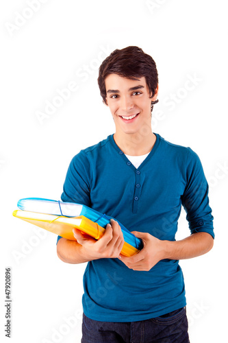 Photo: Young happy student carrying books Young happy student carrying books