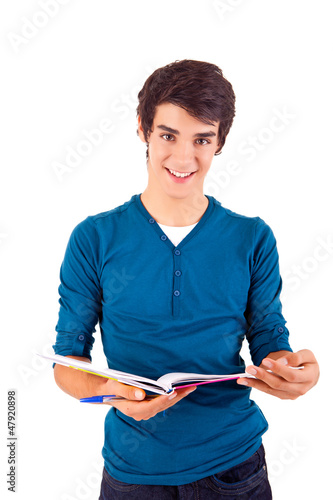 Photo: Young happy student carrying books Young happy student carrying books