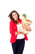 Young female holding a shopping bag on white background
