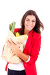 Young female holding a shopping bag on white background
