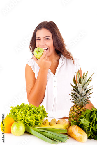 Photo: Happy young woman with fruits and vegetables Happy young woman with fruits and vegetables