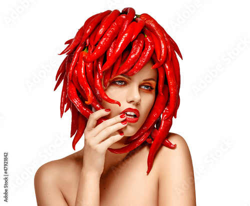 Photo: Autumn Styled Woman with Hot Red Chili Pepper as Headdress. Arts Autumn Styled Woman with Hot Red Chili Pepper as Headdress. Arts