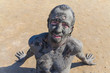 Man smeared with healing mud