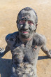Man smeared with healing mud