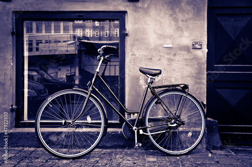 Photo: Classic vintage retro city bicycle in Copenhagen, Denmark Classic vintage retro city bicycle in Copenhagen, Denmark