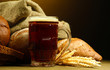 tankard of kvass and rye breads with ears,