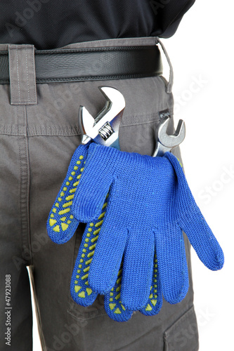 Photo: gloves and instruments in back pocket close-up gloves and instruments in back pocket close-up