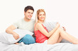Lovely heterosexual couple in pajamas in a bed