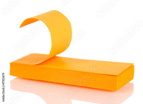 Photo: Orange sticky notes isolated on white Orange sticky notes isolated on white