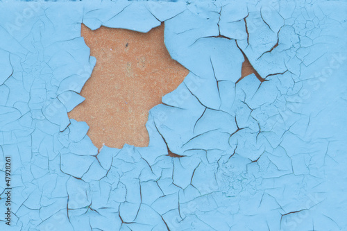 Photo: Old paint peeling from wall texture background Old paint peeling from wall texture background
