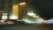Cars go, stop and continue driving in city center
