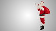 Santa Claus with a loudspeaker making an announcement, side view