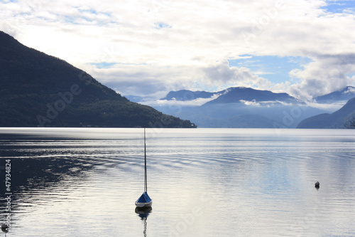Photo: A lonely boat on Lake Maggiore ( Italy ) A lonely boat on Lake Maggiore ( Italy )