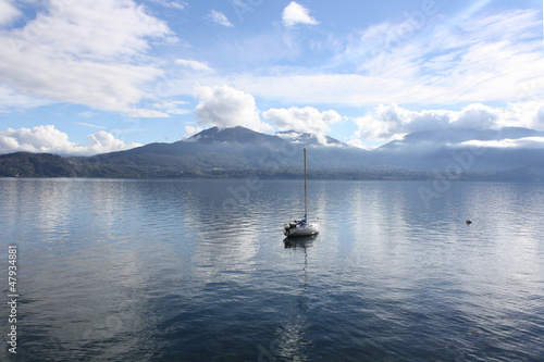 Photo: A lonely boat on Lake Maggiore ( Italy ) A lonely boat on Lake Maggiore ( Italy )