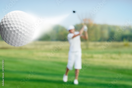 Photo: Golfer and golf ball Golfer and golf ball