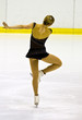 Photo: woman figure skater woman figure skater