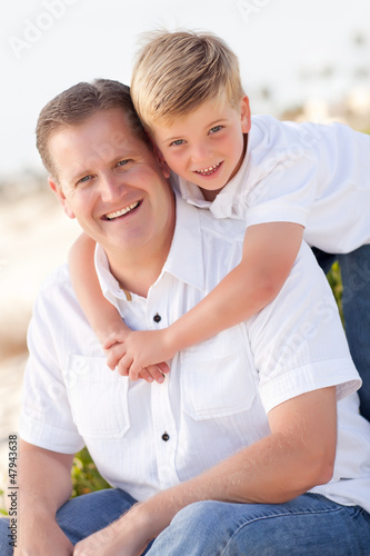 Photo: Cute Son with His Handsome Dad Portrait Outside Cute Son with His Handsome Dad Portrait Outside