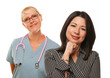 Hispanic Woman with Female Doctor or Nurse