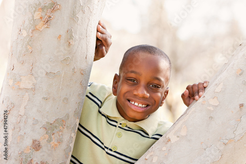 Photo: Young African American Boy Playing in the Park Young African American Boy Playing in the Park