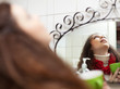 ill woman gargling throat
