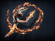 Young woman in gymnast suit posing